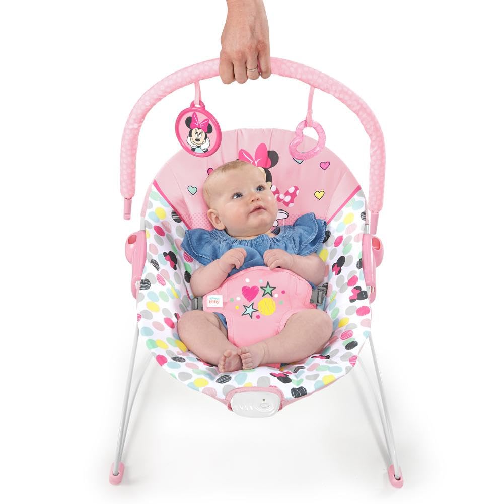 Bright Starts, Disney Baby, Minnie Mouse Spotty Dotty, Babywippe mit Vibrationen, maschinenwaschbarem Sitzpolster, rutschfesten Füßen und 2 Spielzeugen, ab 0 monate