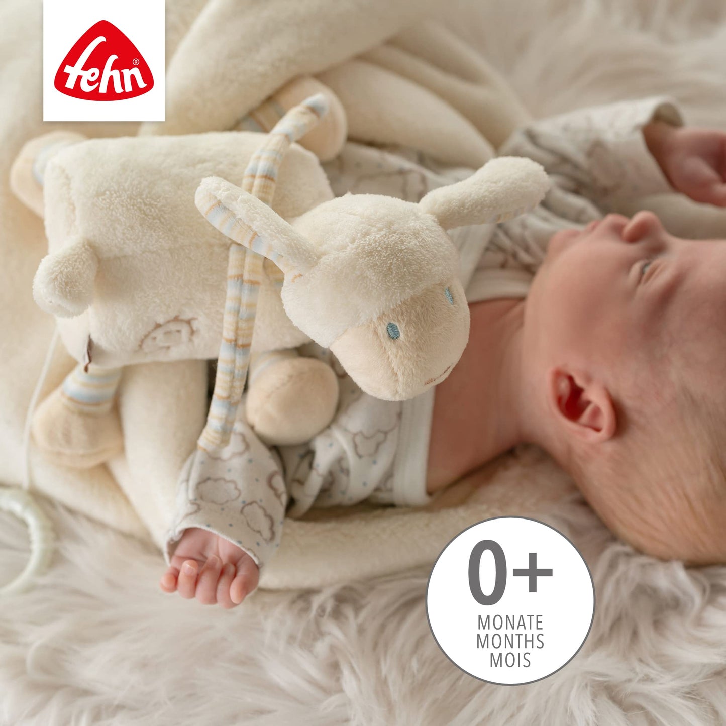 Fehn Spieluhr Baby Einschlafhilfe Schaf - Kuscheltier mit sanfter Einschlafhilfe Melodie "Guten Abend, gut´ Nacht" - Babyspielzeug für Unterwegs und Zuhause - Musikspielzeug für Babys und Kleinkinder