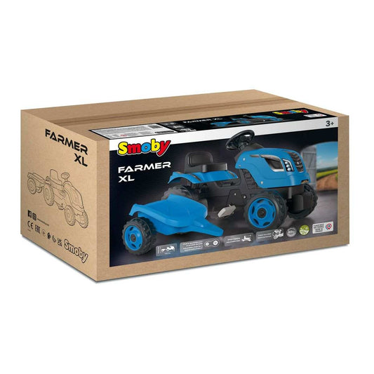 Blau-schwarzer Rutschauto Smoby Trailer Traktor für Kinder ab 3 Jahren spielend außen