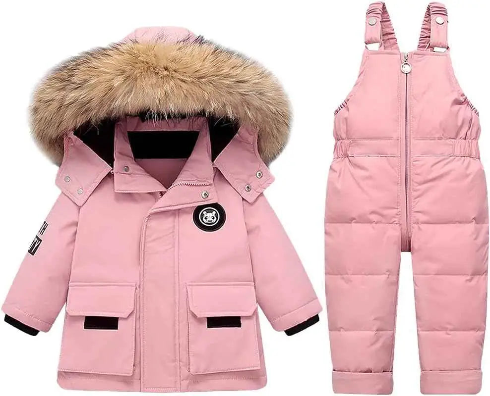 Rosa kinder winter schneeset mit fellbesetzter kapuze und schwarzen akzenten aus der schneeanzüge mädchen kollektion