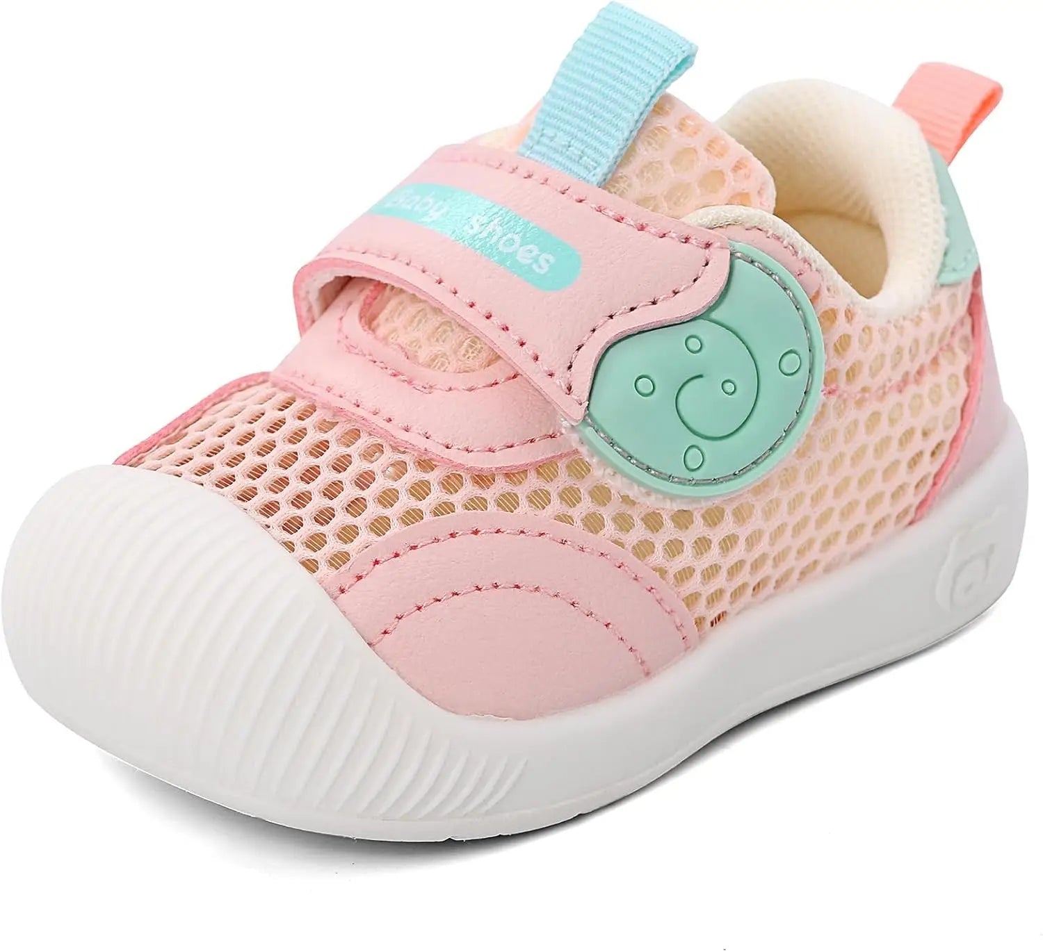 Rosa mesh kindersneaker mit hellblauem smiley-patch und weißer gummisohle aus der schuhe kollektion