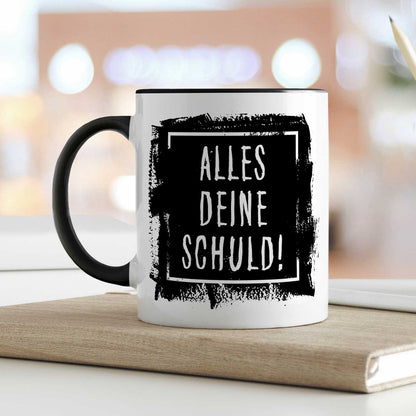 Bedruckte Tasse mit Spruch Alles Deine Schuld!