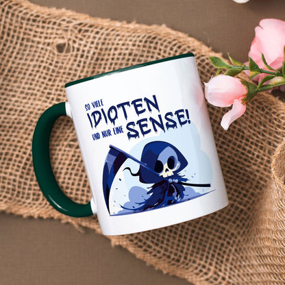 Bedruckte Tasse mit Spruch in blau - So viele Idioten und nur eine Sense