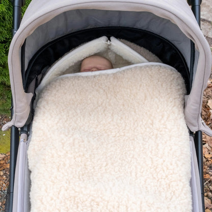 Winter footmuff/sleeping bag made of merino wool – for baby baths &amp; strollers