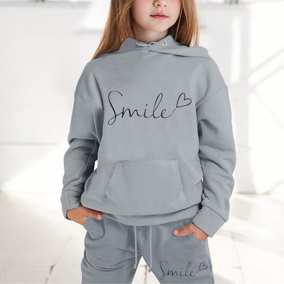 Mädchen 2-teiliges Outfit Herbst Hoodie Lächeln Sweatsuit Sets Kinder 2025 mit Kapuze Ausgehen Sweatanzüge Sweatshirt mit Taschen Grafik Langarm Brief Kordelzug Sweatsuits Sets