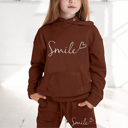 Mädchen 2-teiliges Outfit Herbst Hoodie Lächeln Sweatsuit Sets Kinder 2025 mit Kapuze Ausgehen Sweatanzüge Sweatshirt mit Taschen Grafik Langarm Brief Kordelzug Sweatsuits Sets