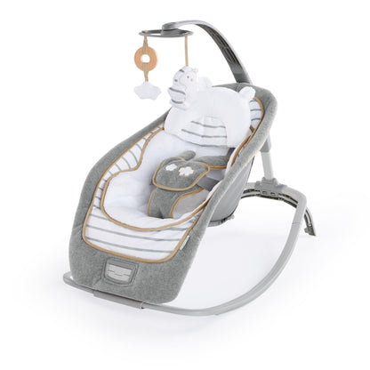Ingenuity, Cuddle Lamb Babywippe Babyschaukel mit Schaukelfunktion und Vibrationen, Spielbogen mit 2 Plüsch Spielzeug, Musik, 4 Naturgeräuschen und Lautstärkeregler, ab Geburt bis 18 kg
