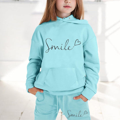 Mädchen 2-teiliges Outfit Herbst Hoodie Lächeln Sweatsuit Sets Kinder 2025 mit Kapuze Ausgehen Sweatanzüge Sweatshirt mit Taschen Grafik Langarm Brief Kordelzug Sweatsuits Sets
