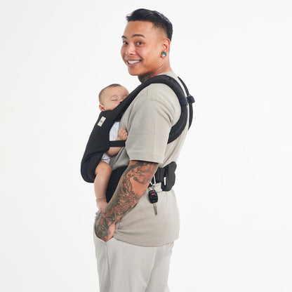 Tula Explore Babytrage für Neugeborene ab Geburt, 3-in-1 Baby-Tragetasche Bauchtrage Rückentrage Ergonomisch (3,2-20,4 kg), Play