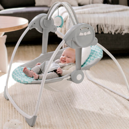 Ingenuity, tragbare Babyschaukel, Cuddle lamp - mit Melodien, Zeit- und Schaukeleinstellung