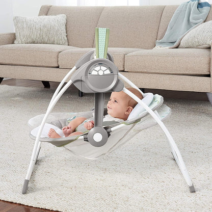 Ingenuity, tragbare Babyschaukel, Cuddle lamp - mit Melodien, Zeit- und Schaukeleinstellung