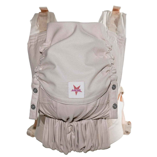 KOKADI Babytrage Flip - ergonomisch, mitwachsend und einfach - sichere Tragehilfe aus Bio-Baumwolle für Neugeborene ab Geburt bis 15kg - Just Cream