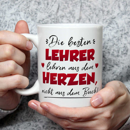 Bedruckte Tasse mit Spruch Die besten Lehrer lehren aus dem Herzen