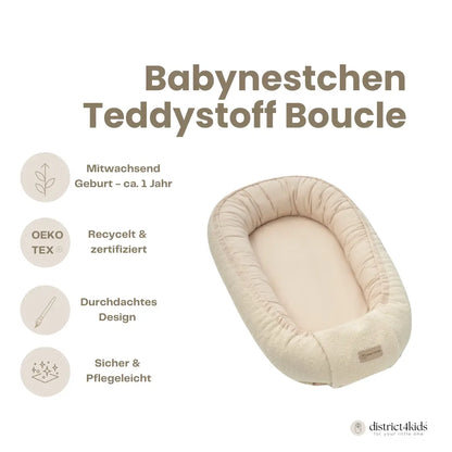 Baby nest made of teddy fabric boucle – a baby cocoon that grows with your child