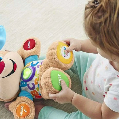 Ein musikalisches plüschtier von mattel in tanfarbe mit interaktiven tasten an pfoten und bauch